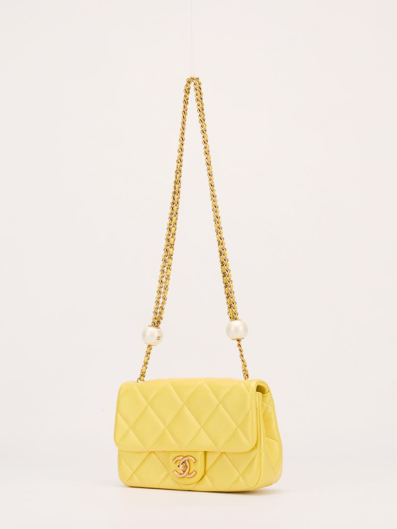 Iridescent Yellow Lambskin Quilted Mini Pearl Crush Flap Bag With GHW