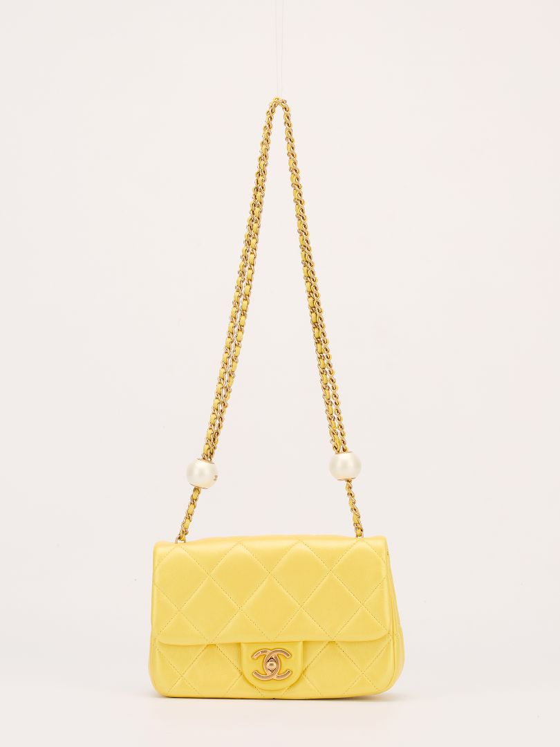 Iridescent Yellow Lambskin Quilted Mini Pearl Crush Flap Bag With GHW