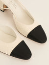 White & Black Embellished Slingback Pumps